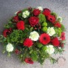 coussin rond de fleurs rouges grenat rennes